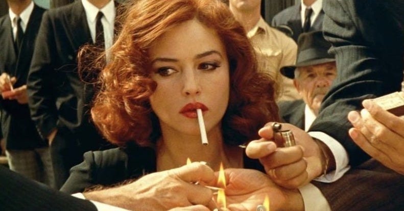 monica bellucci orange dress Monica Bellucci, 51, looks a vision in a tangerine gown as she films TV series Mozart In The Jungle in Venice