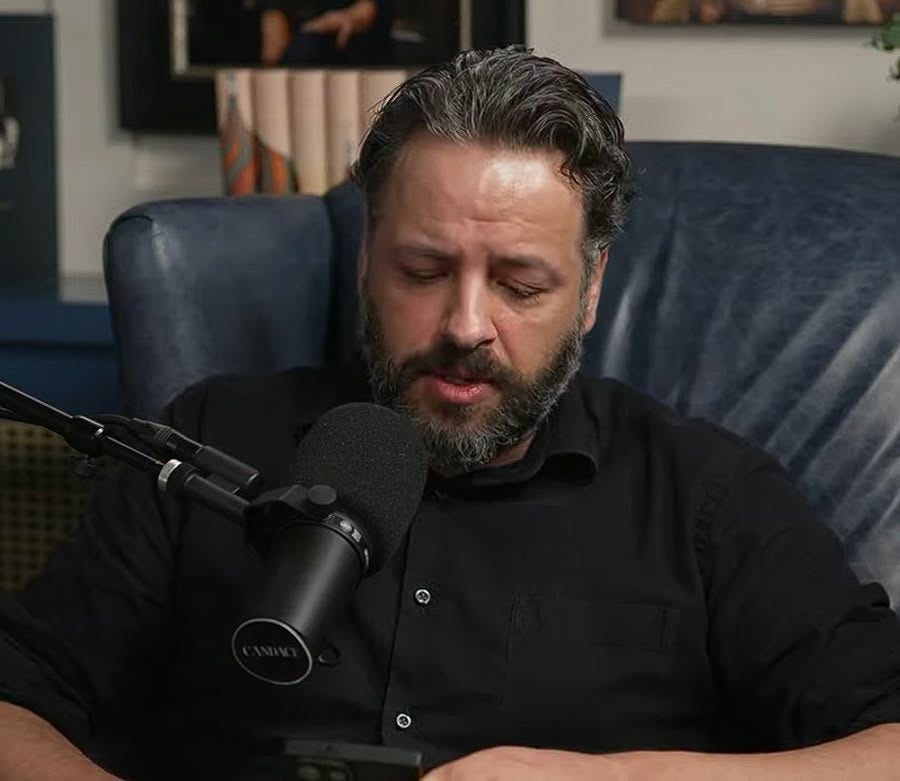 May be an image of one or more people and beard