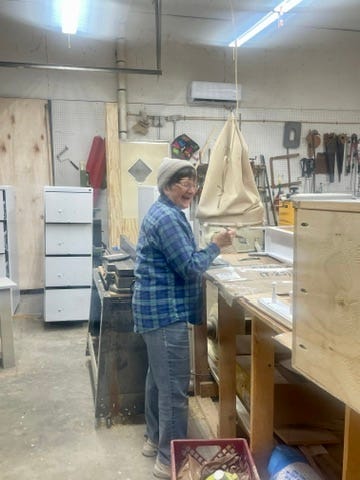 Three photos of team members working in the shop..