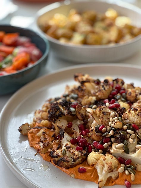 polenta with roasted veg and a creamy romeso sauce with roasted cauliflower