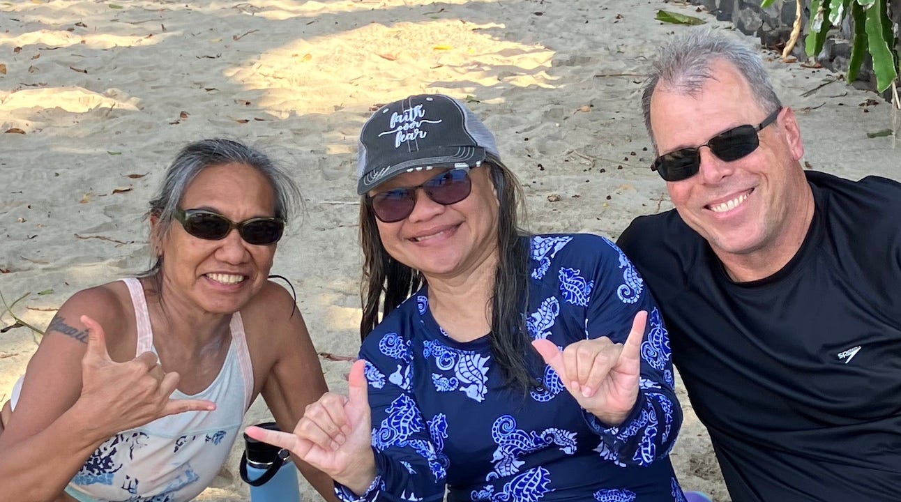 Angeline with Kat and Todd at the beach.