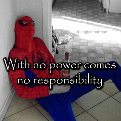 a man in a spiderman costume sits on the floor holding a bottle of wine