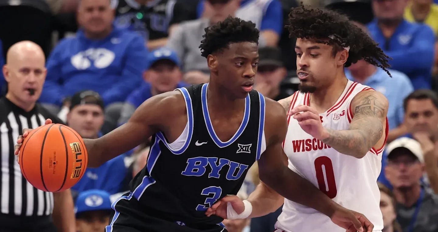 Braeden Carrington defends BYU forward AJ Dybantsa during a game at the Delta Center. Photo credit: Rob Gray. 