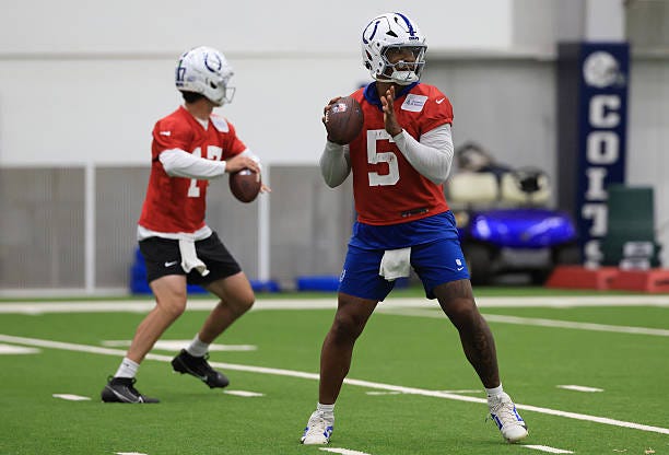 Anthony Richardson and Daniel Jones of the Indianapolis Colts throw a pass during the Indianapolis Colts OTAs at Indiana Farm Bureau Football Center... Anthony Richardson and Daniel Jones of the Indianapolis Colts throw a pass during the Indianapolis Colts OTAs at Indiana Farm Bureau Football Center...