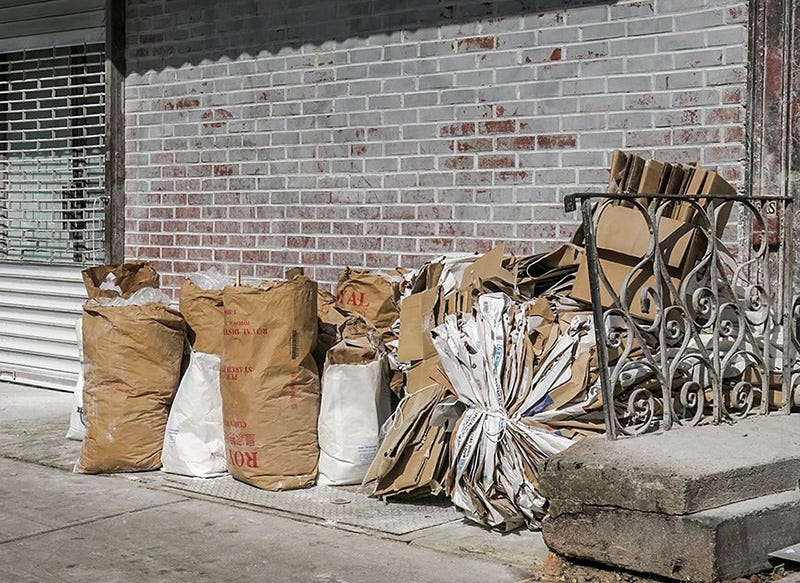 ©Steve Butcher 2022 photo of recycled boxes packed in New York Chinatown