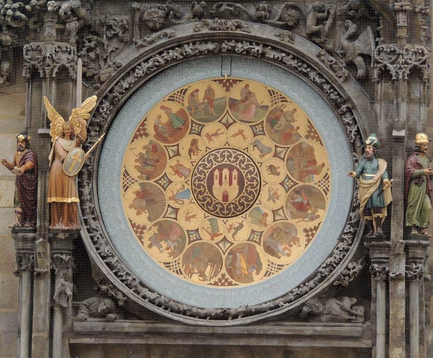 A clock with statues on the side

AI-generated content may be incorrect.