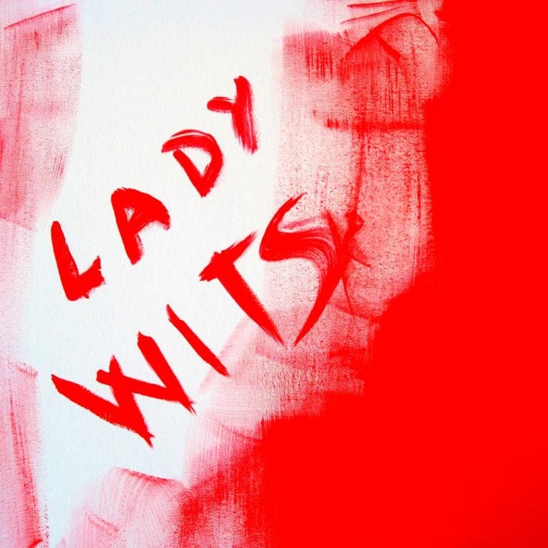 El món de la Lady logo
