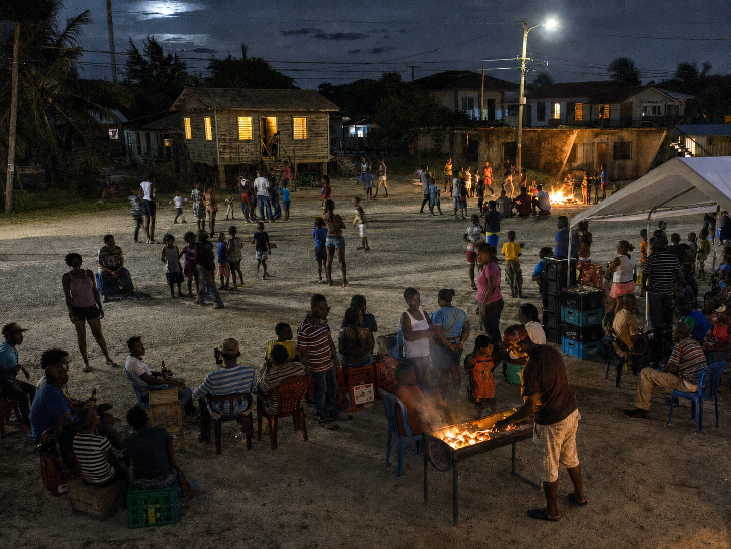 Seine Bight Village in Placencia, Stann Creek, Belize on a typical evening. There is a real sense of community here that is missing from North America and makes moving to Belize worth it.