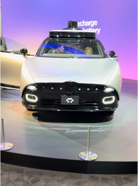 A car on display with people in the background
AI-generated content may be incorrect. A car on display with people in the background
AI-generated content may be incorrect.
