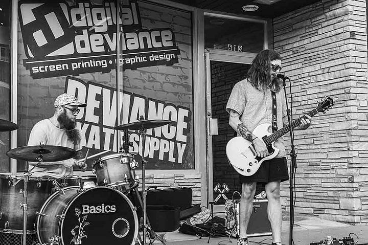 Basics live during Art Walk outside Deviance Skate Supply