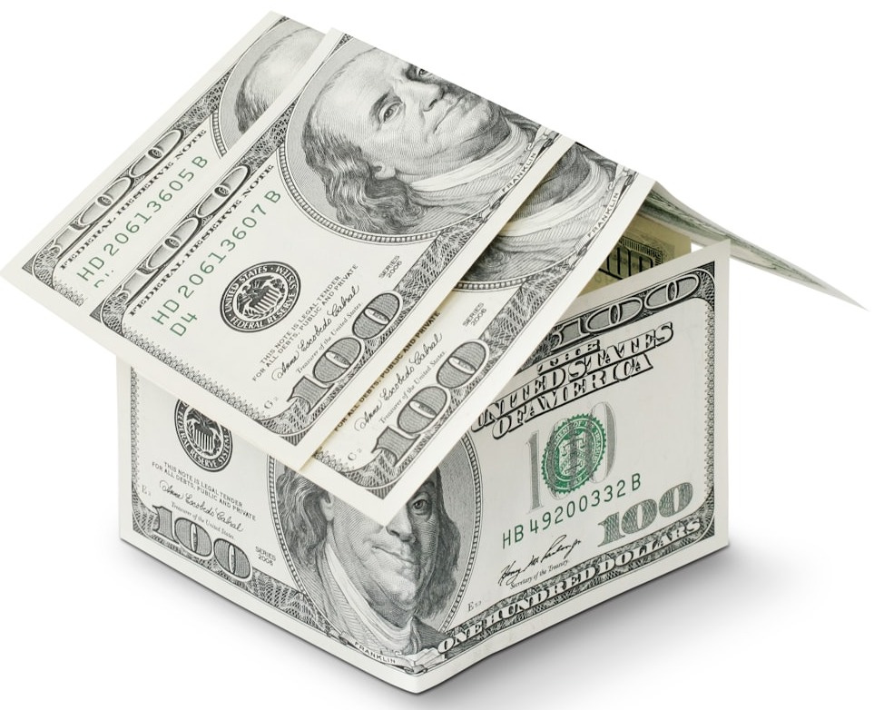 a house made out of money on a white background a house made out of money on a white background