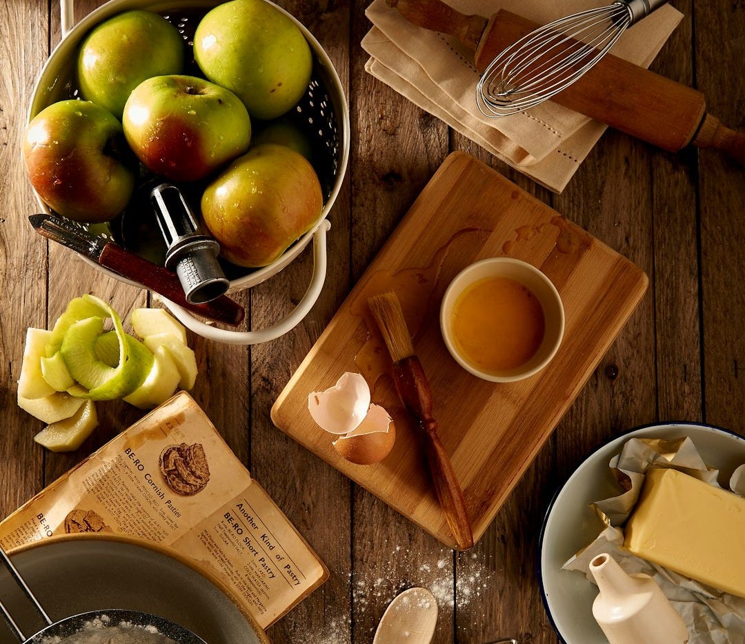 flat lay photography of mug on brown wooden chopping board flat lay photography of mug on brown wooden chopping board