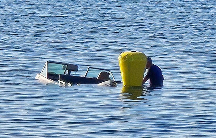 Swamped Boat in Caspian Lake - The Hardwick Gazette