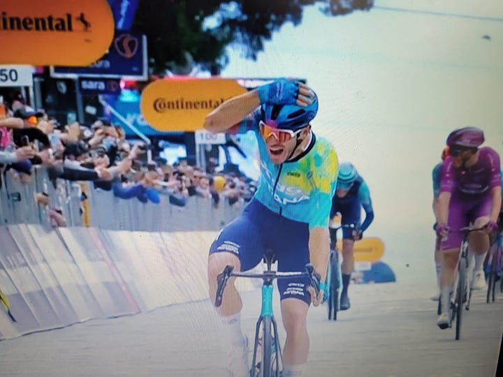 Ciccone with head in hands after taking maglia rosa, Ballerini celebrating his stage win