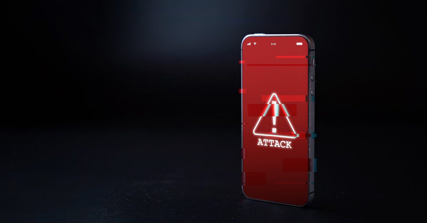 A smartphone with an "attack" symbol A smartphone with an "attack" symbol