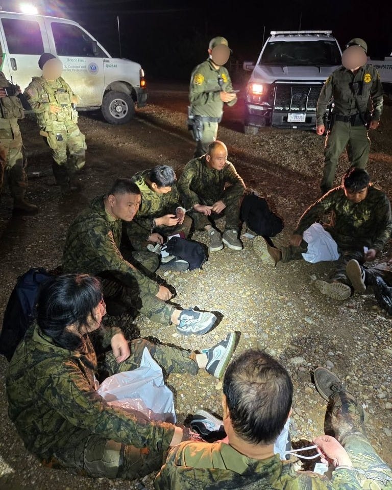 Six camouflaged Chinese citizens were arrested on May 26, 2026, after illegally entering the US at the Texas-Mexico border (Texas Dept. of Public Safety photo)