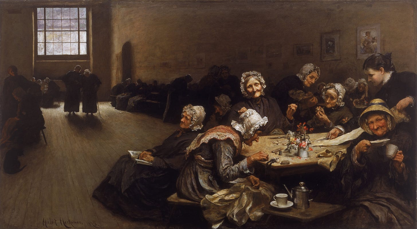 Oil painting of elderly women gathered around a table in a workhouse ward, some doing needlework, in a dim institutional interior.