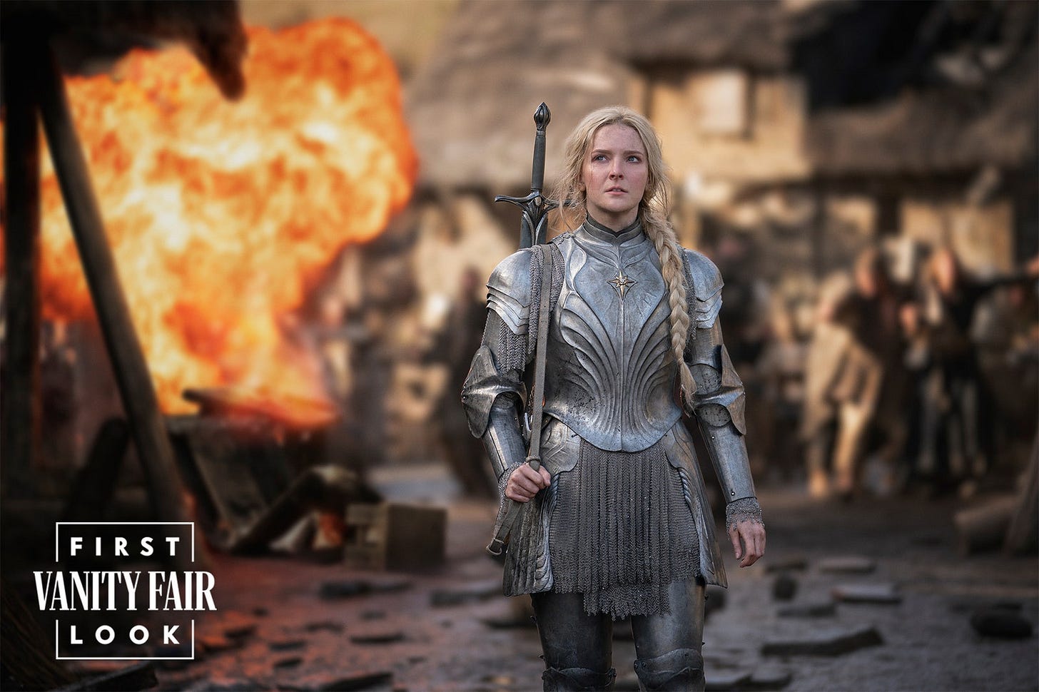 May be an image of 3 people and text that says 'FIRST VANITY FAIR LOOK' May be an image of 3 people and text that says 'FIRST VANITY FAIR LOOK'