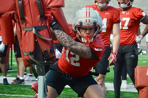 Wisconsin outside linebackers participate in individual position drills during the Badgers' spring football practice Saturday inside Camp Randall Stadium.
