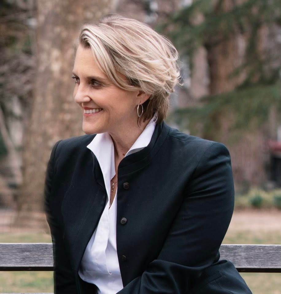 photo of Meghan Daum sitting in profile with blazer on