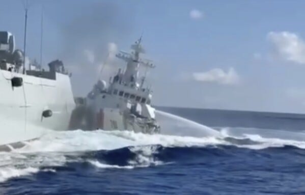In this photo, taken from video and provided by the Philippine Coast Guard, a damaged Chinese Coast Guard ship, right, is seen beside a Chinese Navy vessel, left, after they accidentally collided while chasing a Philippine fisheries boat near Scarborough Shoal in the disputed South China Sea on Monday Aug. 11, 2025. (Philippine Coast Guard via AP) In this photo, taken from video and provided by the Philippine Coast Guard, a damaged Chinese Coast Guard ship, right, is seen beside a Chinese Navy vessel, left, after they accidentally collided while chasing a Philippine fisheries boat near Scarborough Shoal in the disputed South China Sea on Monday Aug. 11, 2025. (Philippine Coast Guard via AP)