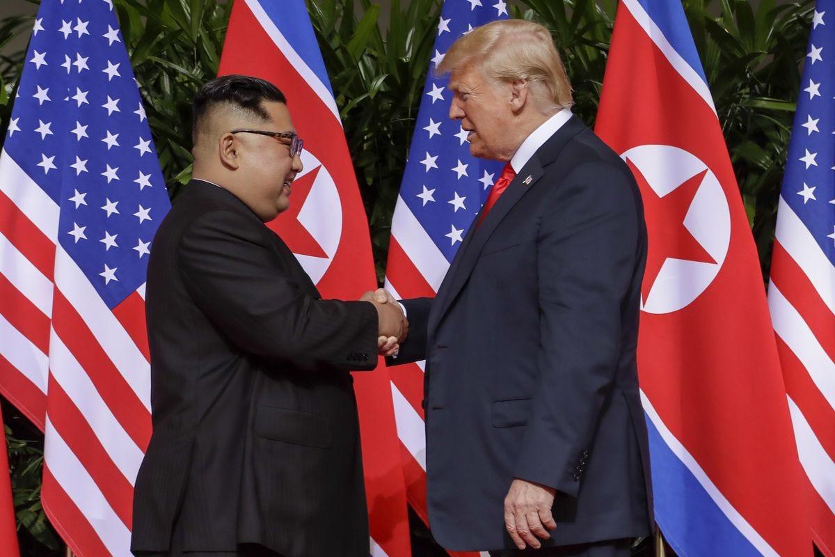 North Korea summit begins with Trump-Kim handshake - Vox