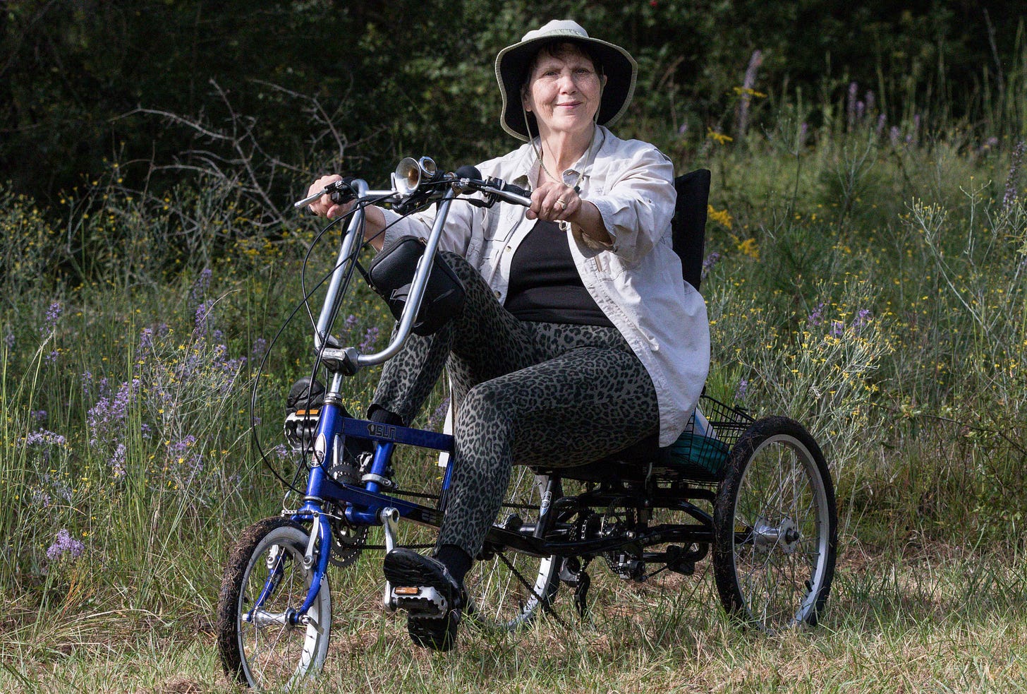 Photo of Ann on her recumbent tricycle.