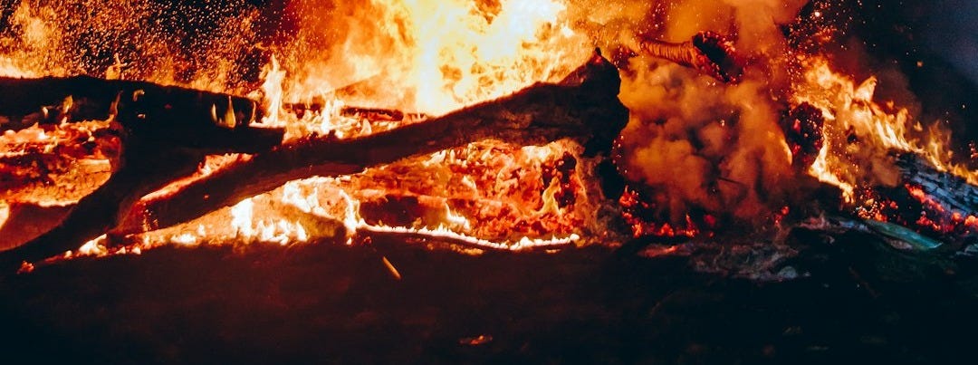 fire with black smoke during night