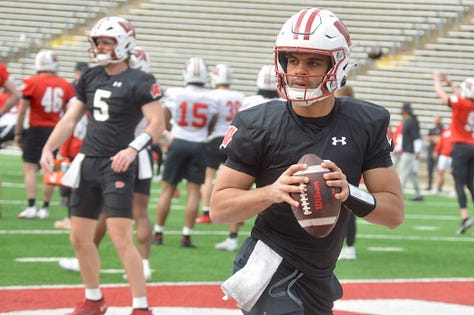 Wisconsin quarterbacks participate in individual position drills during Saturday's spring practice inside Camp Randall Stadium.