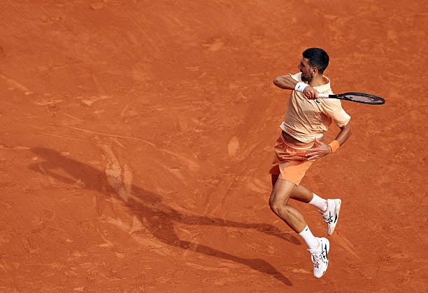 Novak Djokovic of Serbia is seen in action against Joao Fonseca of Brazil in their third round match during Day Six of the 2026 French Open at Roland... Novak Djokovic of Serbia is seen in action against Joao Fonseca of Brazil in their third round match during Day Six of the 2026 French Open at Roland...