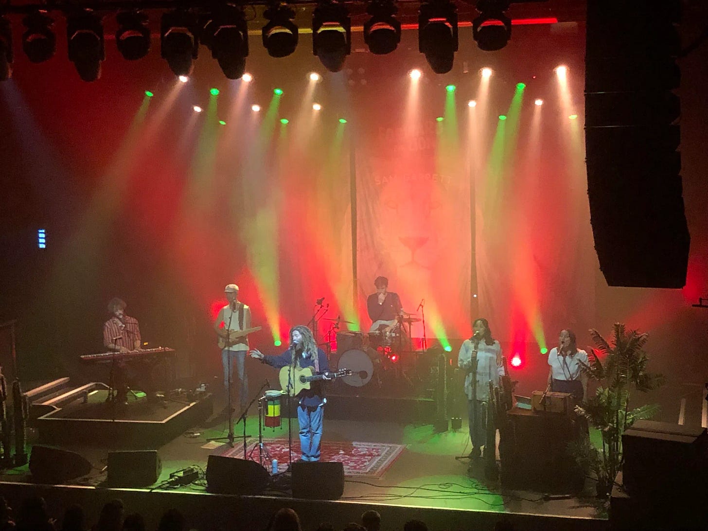 Sam Garett on stage singing