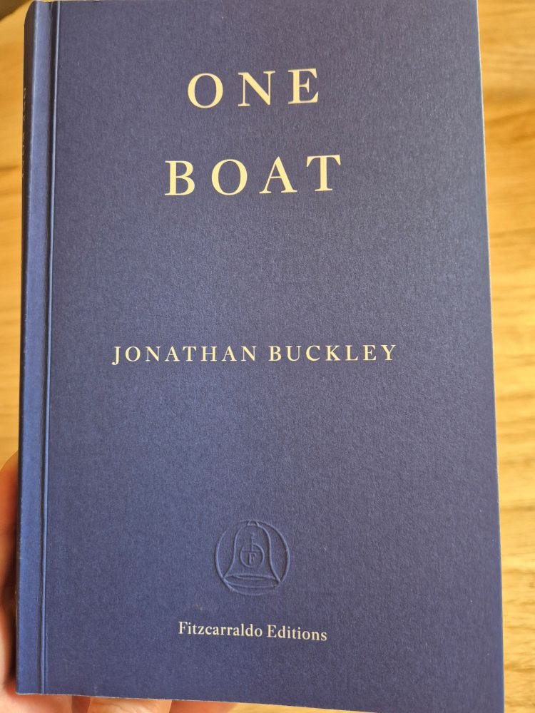 Jonathan Buckley's ONE BOAT, the cover a plain royal blue, as are all Fitzcarraldo Edition books.