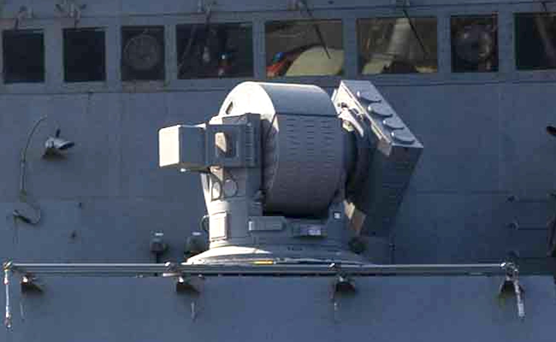 High Energy Laser with Integrated Optical Dazzler and Surveillance (HELIOS) laser weapon system