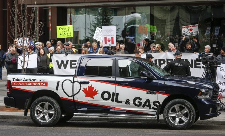 ANALYSIS: When does an 'I love Canadian oil & gas' shirt become political?  | Globalnews.ca