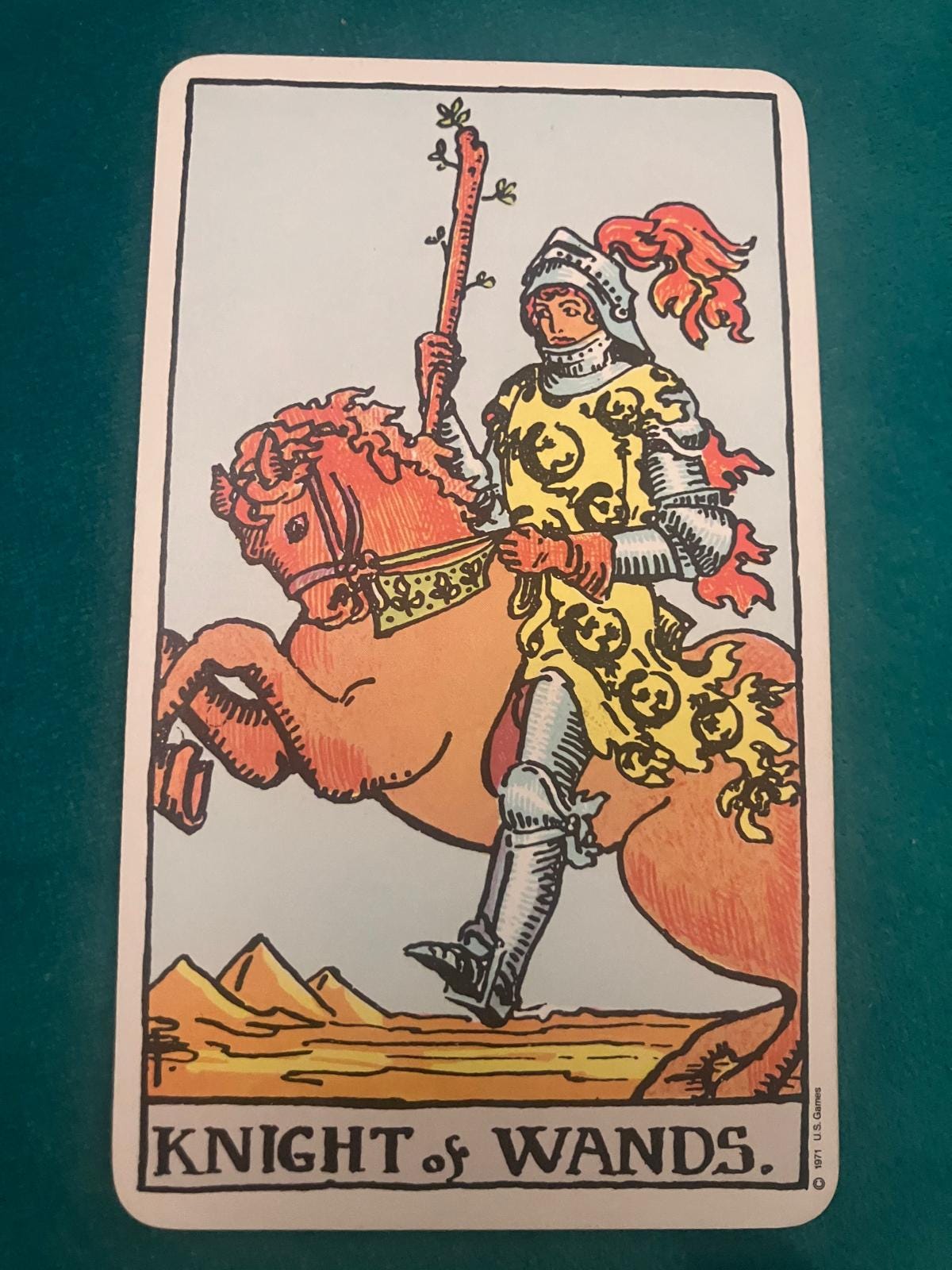 Knight of Wands tarot card from Jill Dawson’s Tarot DMs Chat 42, showing an armoured rider on a rearing horse holding a wand.