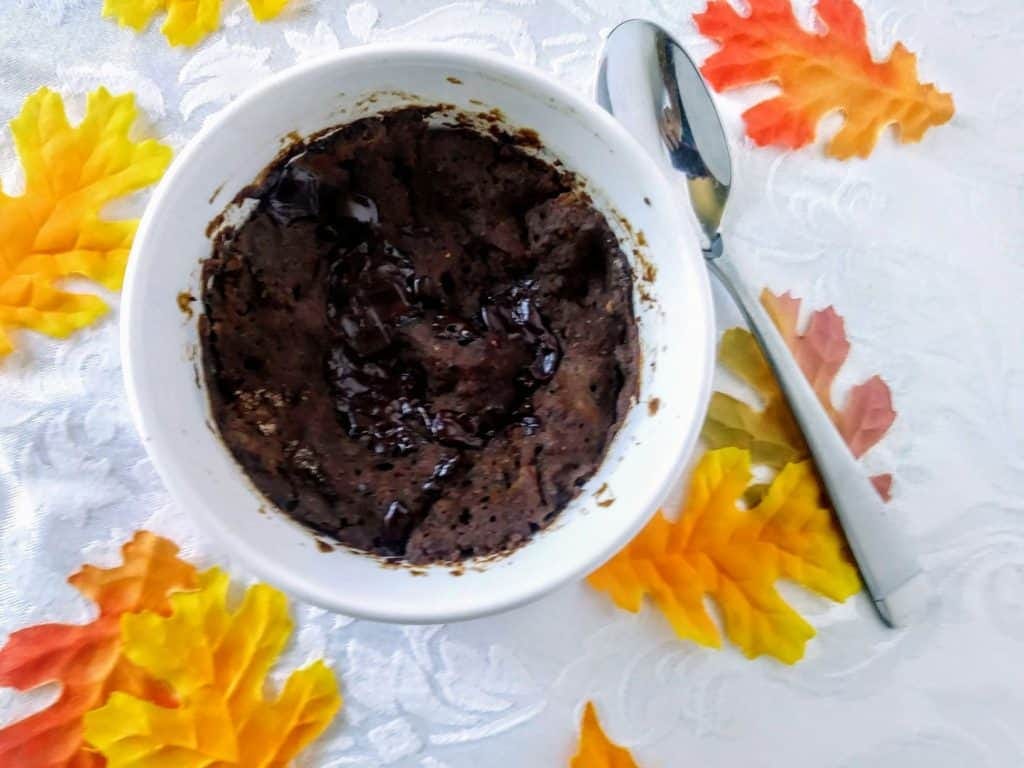 double chocolate pumpkin mug cake with silk fall leaves