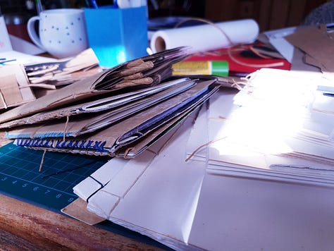Books I made and workspace images from the tween time creativity.