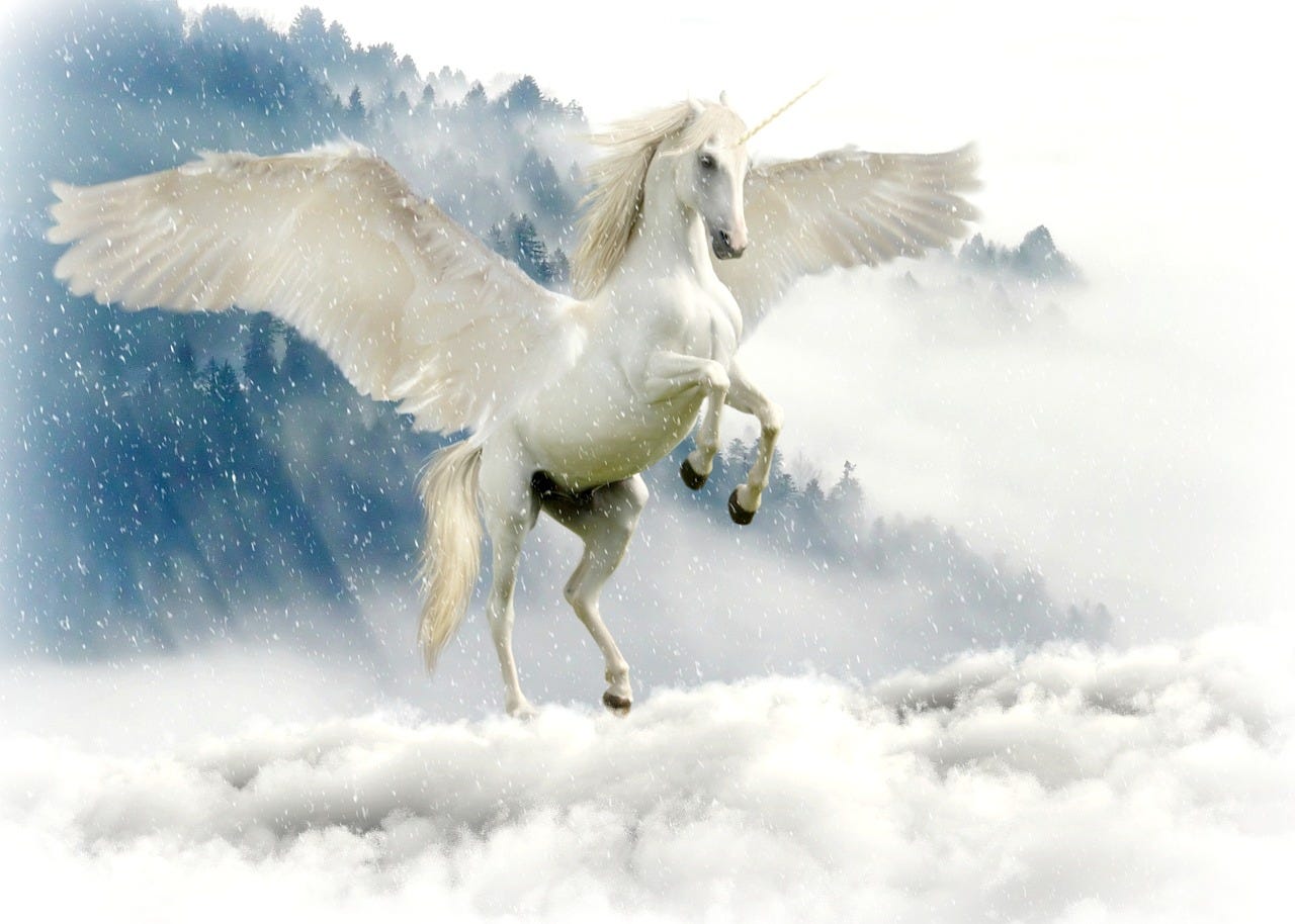 A picture of a unicorn on a cloud