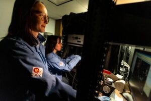 Elizabeth Plunk, PhD (left), alumna of the Toxicology graduate program and Neuroscience graduate student Alexis Feidler (right) work in the Majewska Lab at the University of Rochester Intellectual and Developmental Research Center.