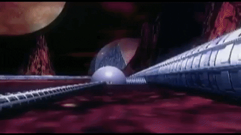 We zoom in from outside on the planet into the window to see the guys dancing again. Justin is doing some weird type of simulated noose action, and the rest of the guys are crossing hands preparing to flip each other.