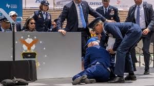 Biden falls on stage at Air Force ...