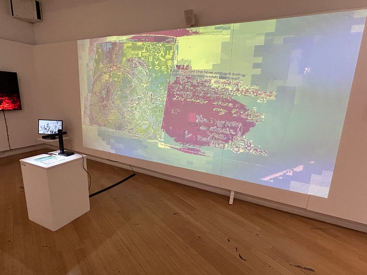 Images of glitched computer graphics and a large projection in a gallery space showing the final work 