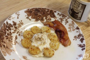 Idaho Sunrise - Tater Tots arranged in a circle with a fried egg in the middle Idaho Sunrise - Tater Tots arranged in a circle with a fried egg in the middle