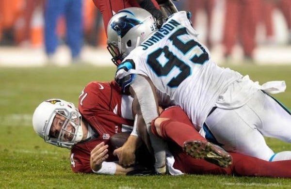 ryan lindley taken down by panthers nfl wildcard 2015 imagtes ryan lindley taken down by panthers nfl wildcard 2015 imagtes