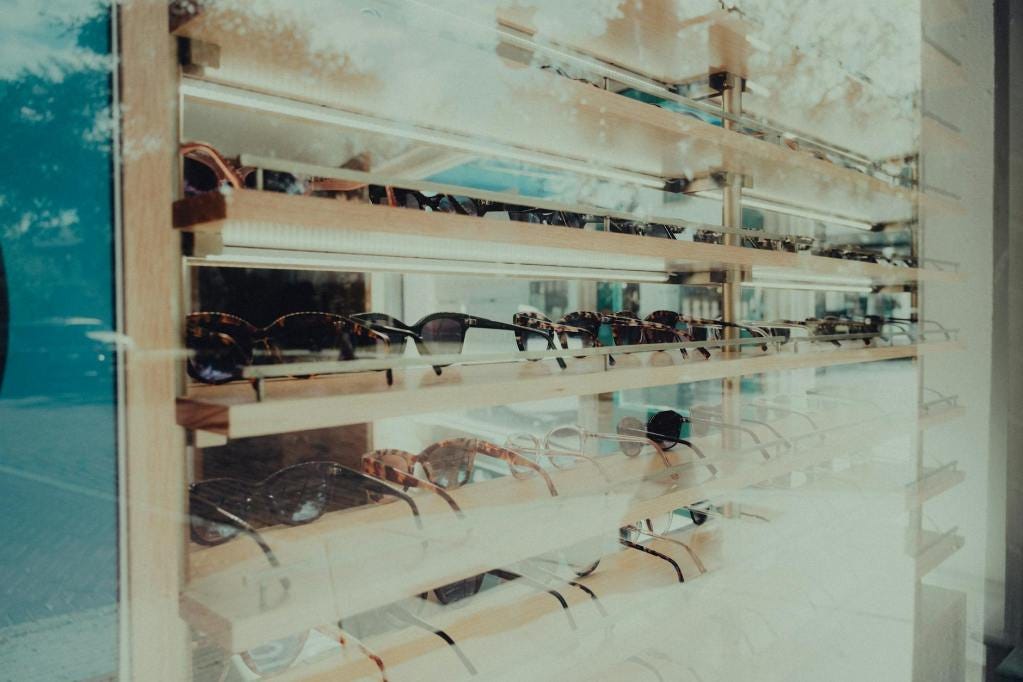 glasses on display in an optical store