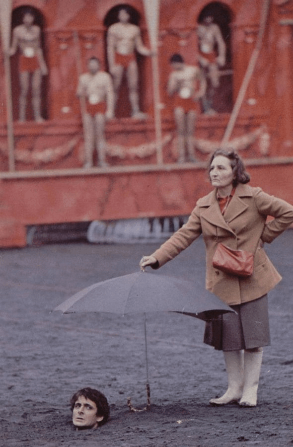 r/Moviesinthemaking - a person holding an umbrella