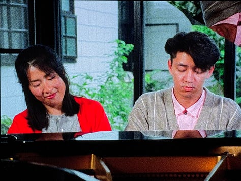 Still images from Tokyo Melody: two photos of Sakamoto and Akiko Yano playing piano together, and an image of Sakamoto performing in YMO.