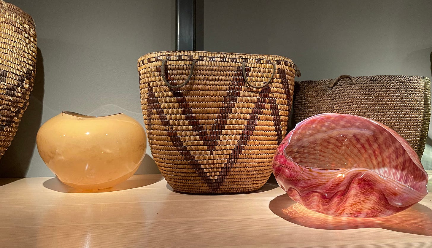 arrangement of glass baskets and woven baskets