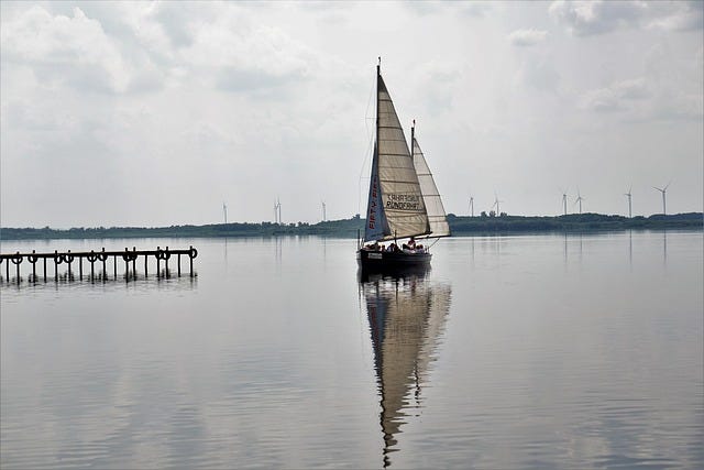 Sail boat on lake or bay