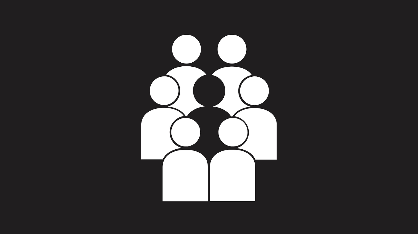 A graphic of six people surrounding a person in the center with the individuality of the person in the center indicated by different shading than the six people surrounding them.